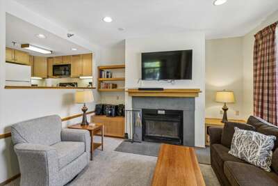 Living Room with Fireplace and TV