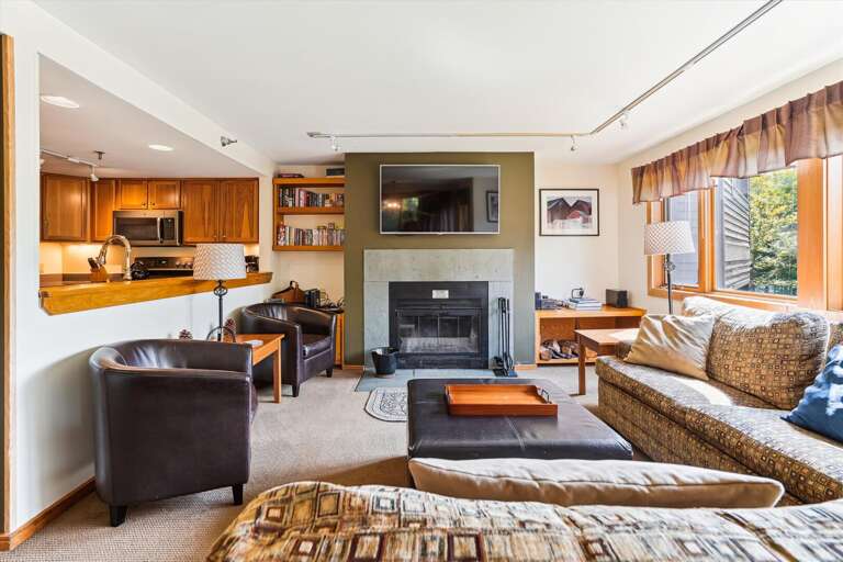 Spacious living room. Enjoy the woodburning fireplace.