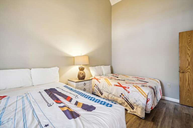 Bright bedroom with 2 double beds