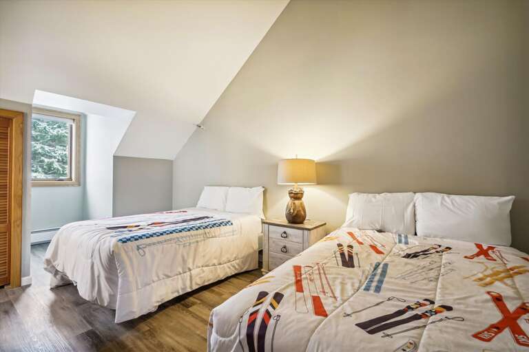 Bright bedroom with 2 double beds