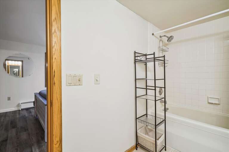 Full bathroom with shower and tub