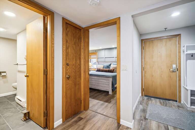 king bedroom, full bathroom and entrance to your condo