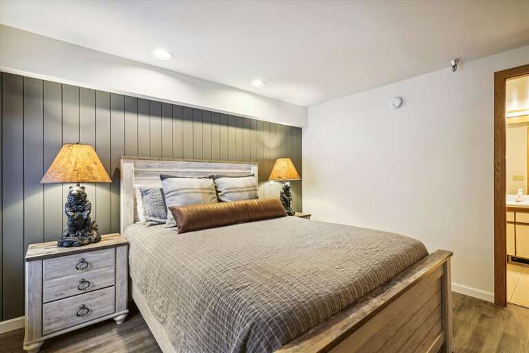 Modestly decorated queen bedroom.   Sleep in style and comfort!