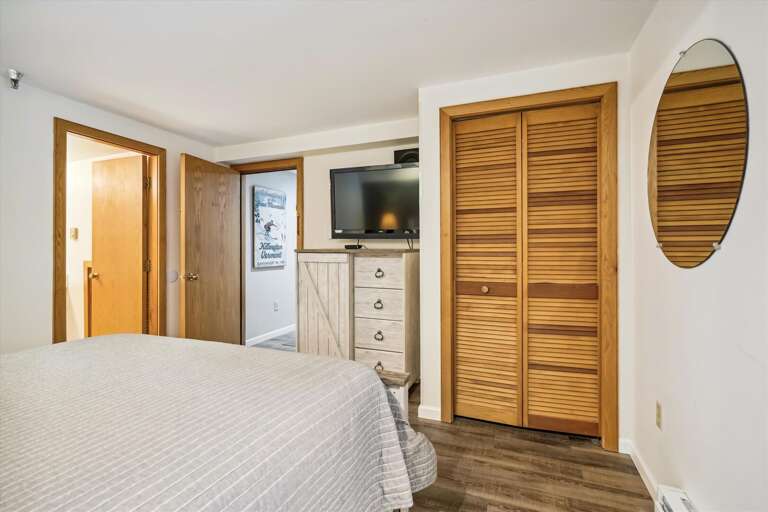 Modestly decorated queen bedroom.   Sleep in style and comfort!