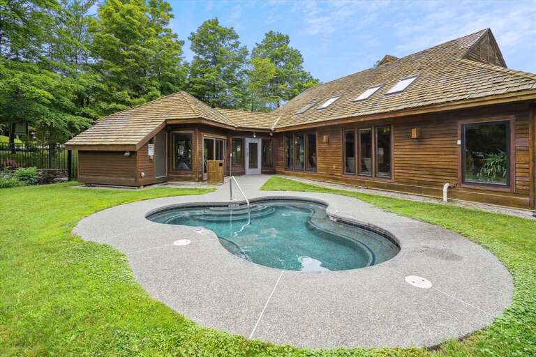 Outdoor hot tub that seats up to 20 people.