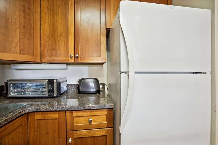 Many appliances in this kitchen. Many appliances in this kitchen.