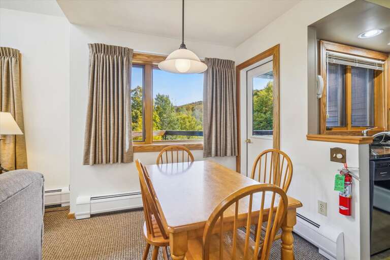 Dining area seats four comfortably.