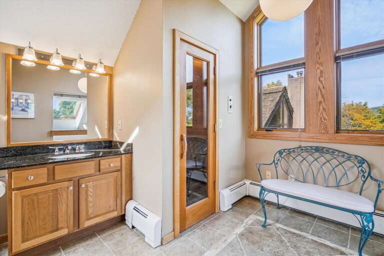 Full bathroom with a sauna.