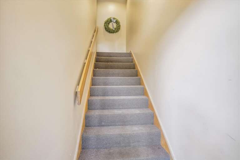 Stairway to the upper level.