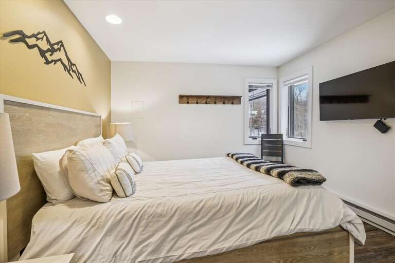 Enjoy the flat screen tv, while lying in bed.