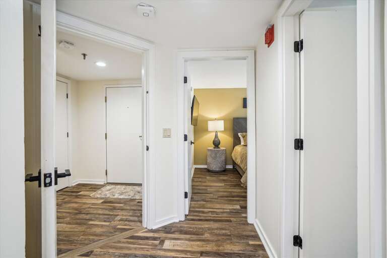 View of the bedroom and entrance.