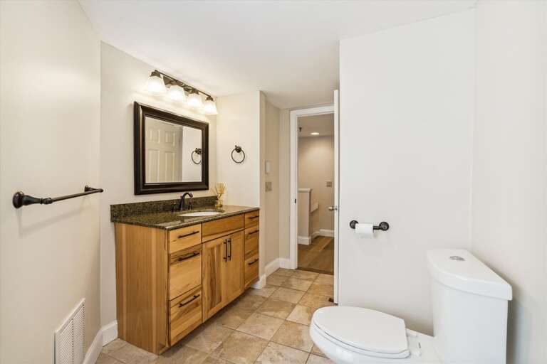 Main level full bathroom. Main level full bathroom.