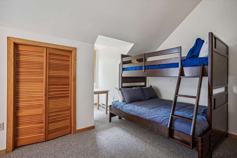 This bedroom has plenty of closet space.