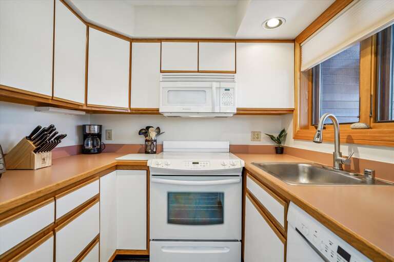 Compact Kitchen with Mountain Condo Charm
