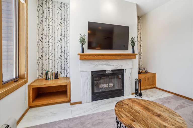 Relaxing Fireplace & TV Area