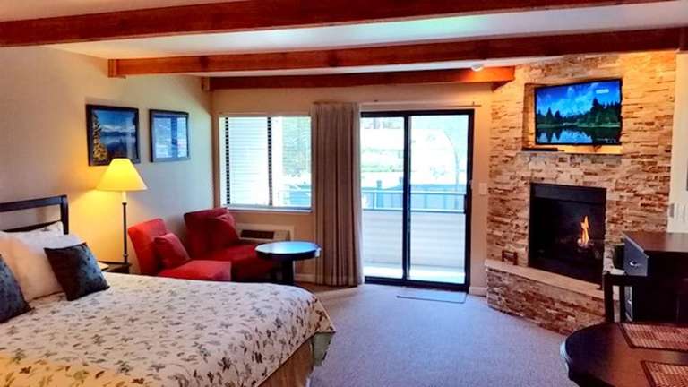 King bed with Thermostat controled Fireplace and Dimmable lighting