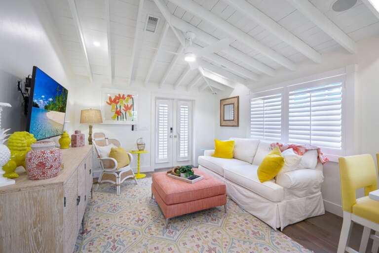 Bright Interior Living Space With White Sofa And Colorful Accents