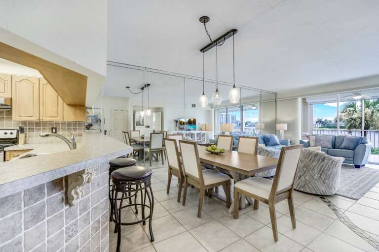 Interior Of Vacation Rental With Kitchen And Dining Area Interior Of Vacation Rental With Kitchen And Dining Area
