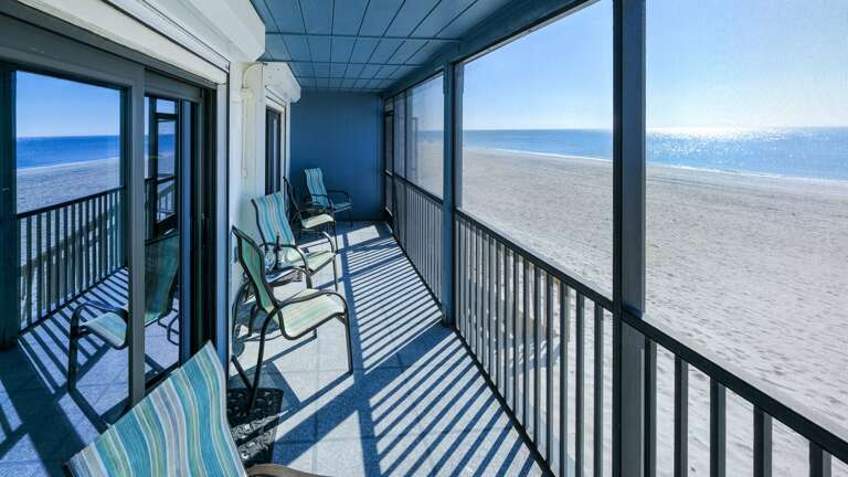 Screened deck and beach walk-out
