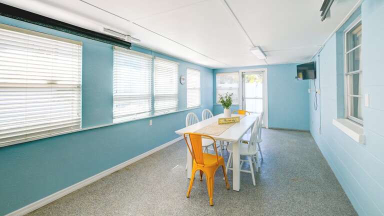 Bonus space with pool view and dining