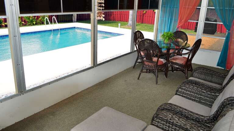 Space to Read, Relax and Enjoy the Pool View.