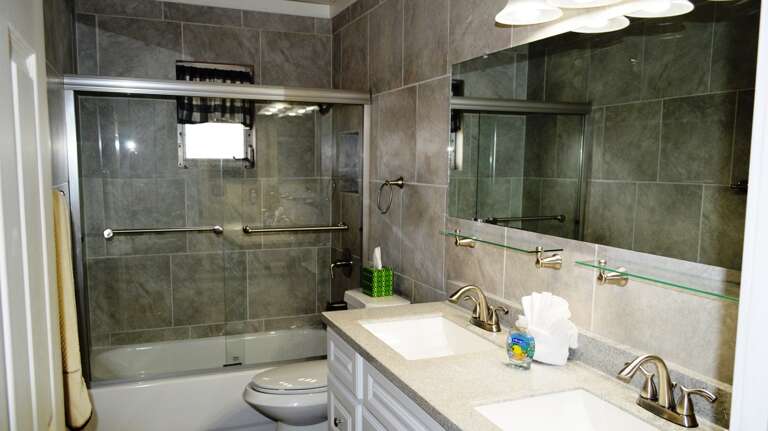Bathroom with Tub/Shower Combo and Double Sinks
