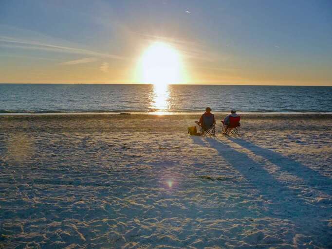 Relax and Watch the Sunset on the Gulf Beach