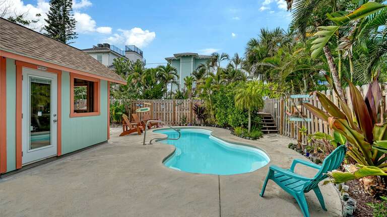 Relax at the pool and Tiki hut