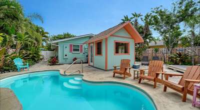 Enjoy swimming, sunning and tiki fun