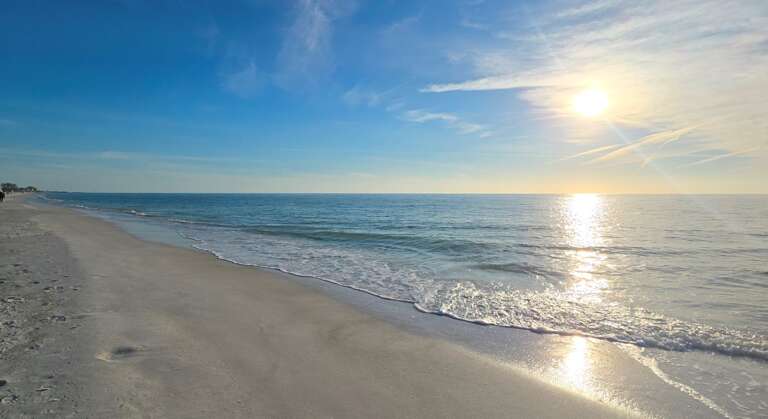 Stroll the silky sands