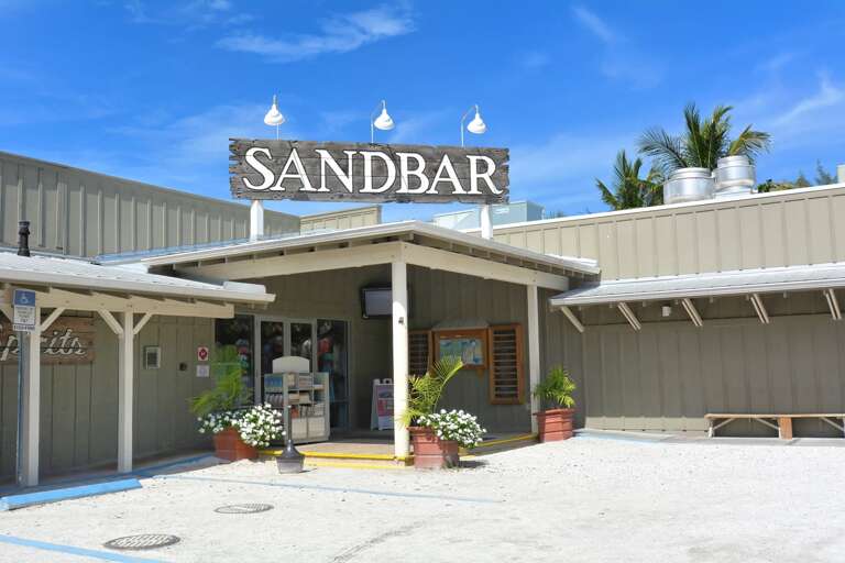 Walk the path to the Sandbar for beachfront dining