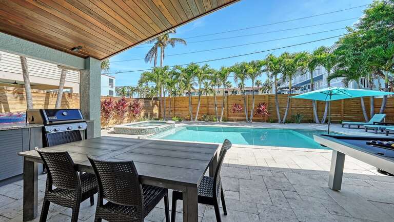 Dine poolside under shelter