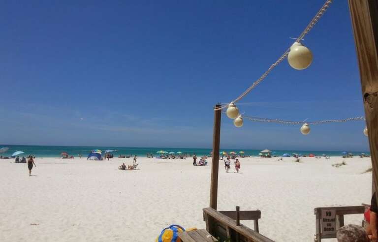 Beach Dining at The Sandbar Right Down Beach