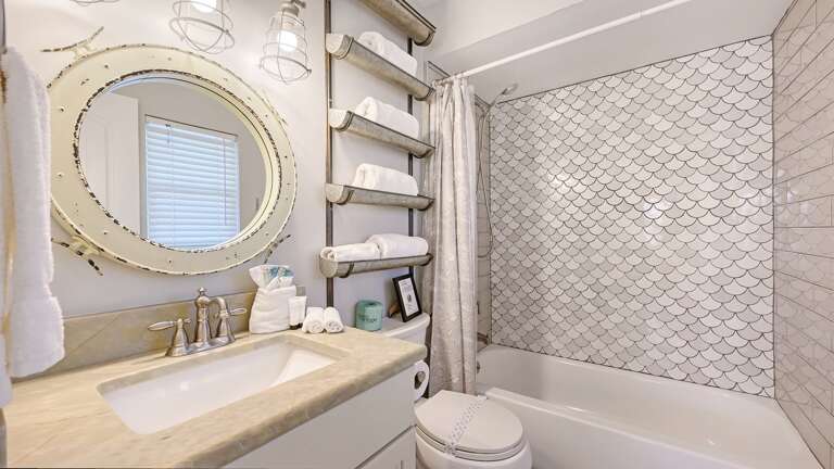 Full bath with tub shower combo