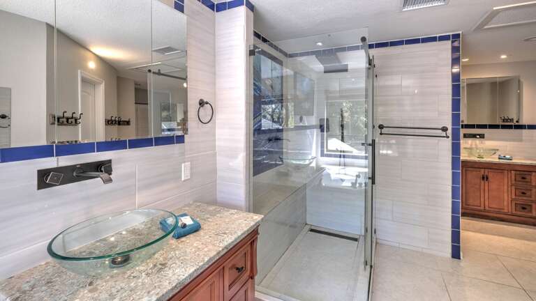 Enjoy Two Vanities and Separate Water Closet