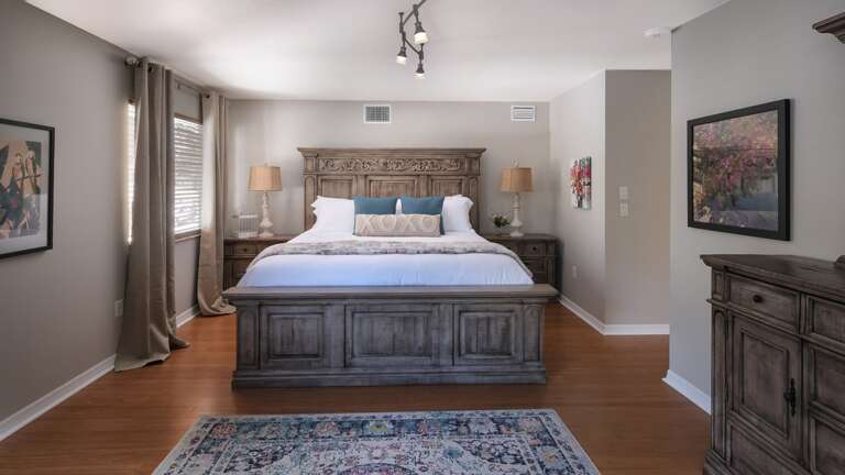 Elegant Primary Bedroom Suite up the Stairs