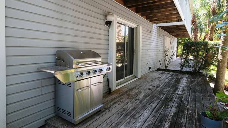 Gas Grill on Ground Level Deck with Garage Access