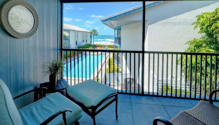 Screened Lanai with Beach and Pool view