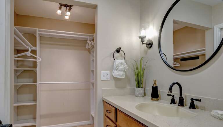 Walk in closet in ensuite bath