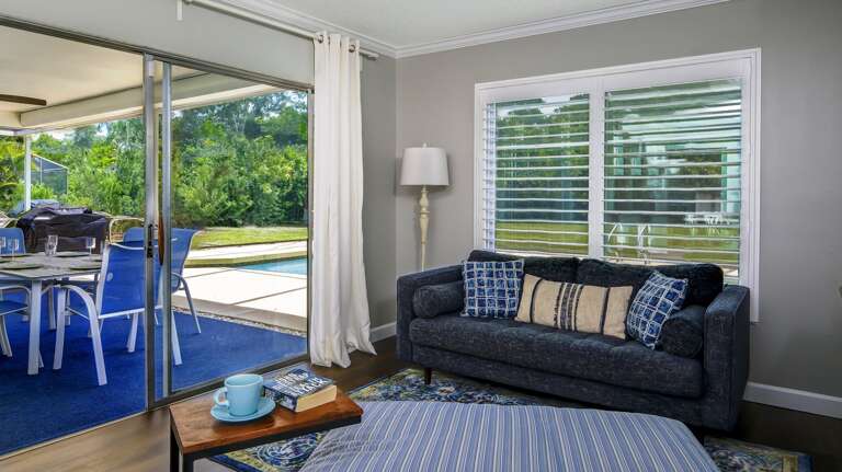 Cozy den exits to patio