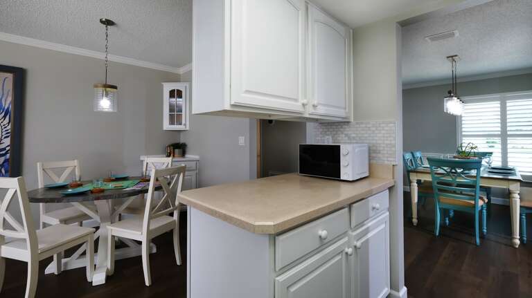 Counter Bar Pass Through to Game Table/Breakfast Area