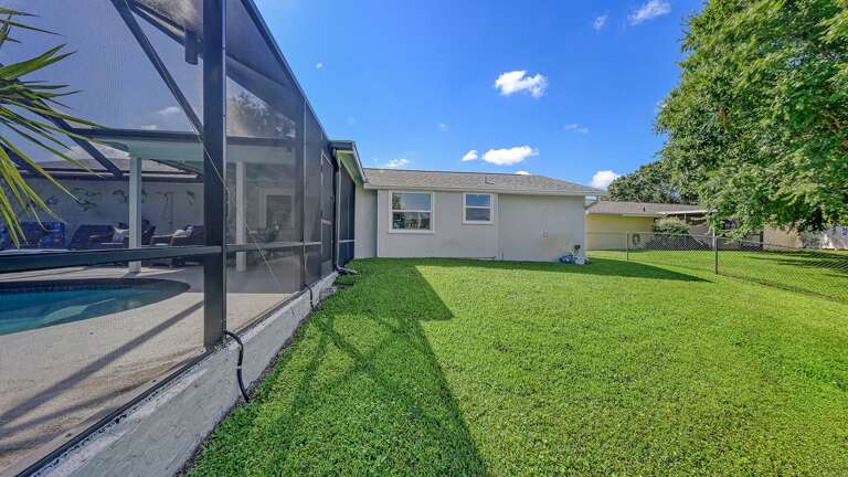 Fenced yard with room for dog to play
