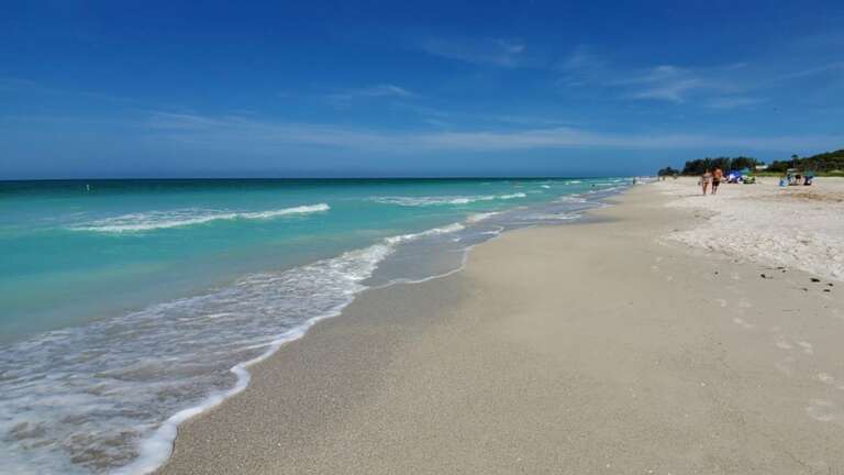 Stroll or relax to lapping waves