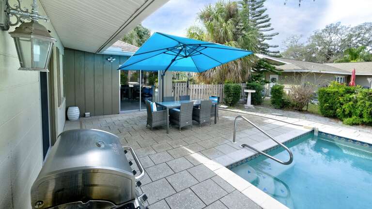 Gas Grill and Large Table & Umbrella for Patio Dining