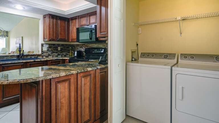 Laundry Closet with Full-Size Washer and Dryer