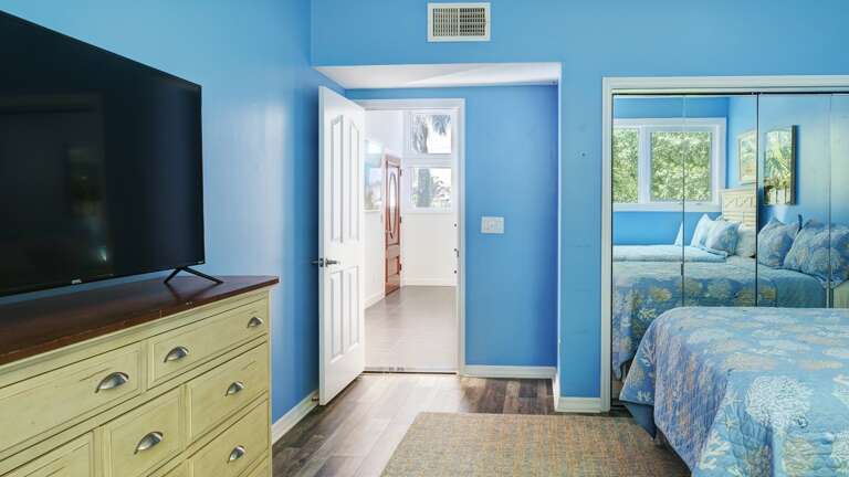 Second Bedroom with TV on the Mid-Level Second Bedroom with TV on the Mid-Level