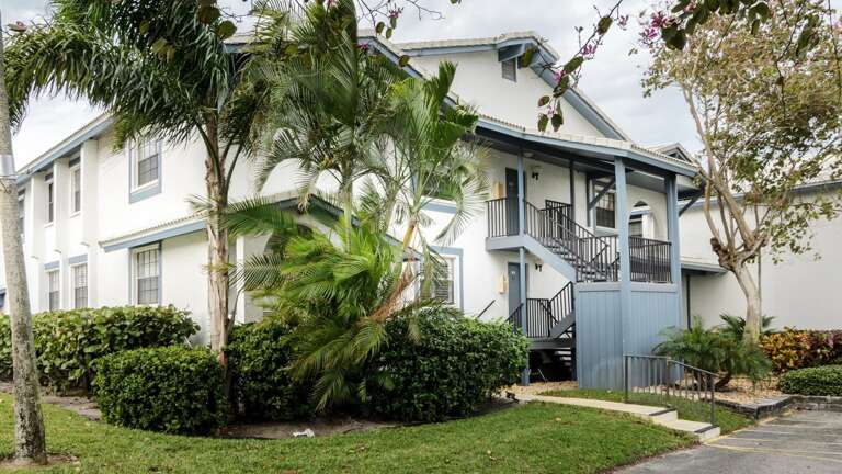 Upper Level Entry with Assigned Parking