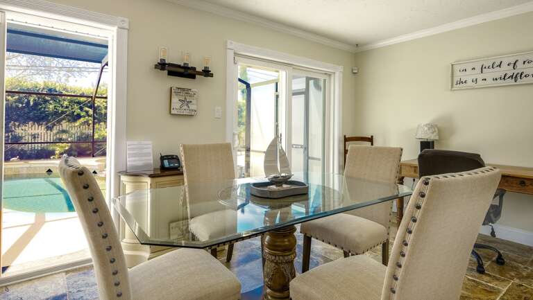 Dining Area Exits to Pool and Patio Dining Area Exits to Pool and Patio