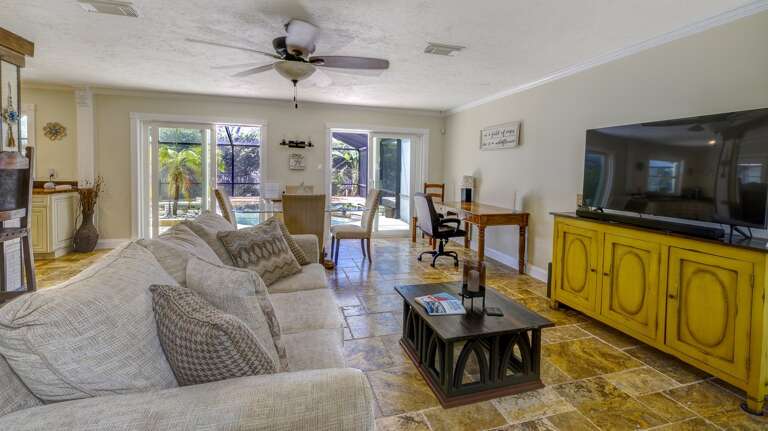 Pretty Views from Living Room to Dining and Pool