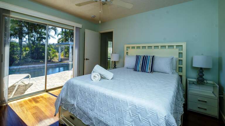 Bedroom 2 has Queen Bed with Pool Access